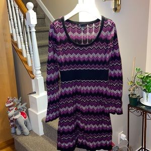 Nice sweater dress or you can wear it as a top with leggings.